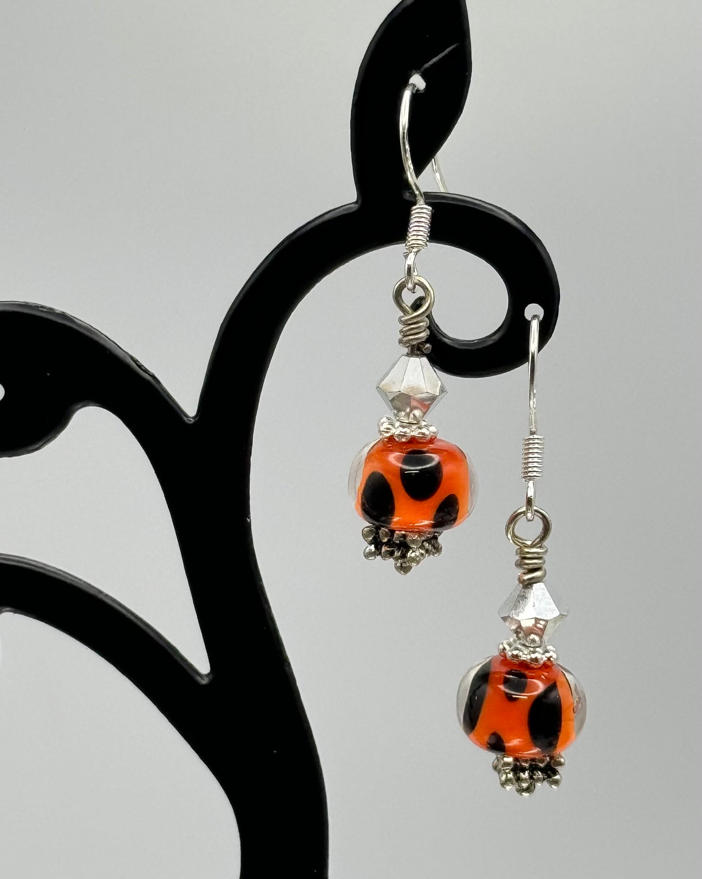 Handmade petite Halloween colored lampwork earrings