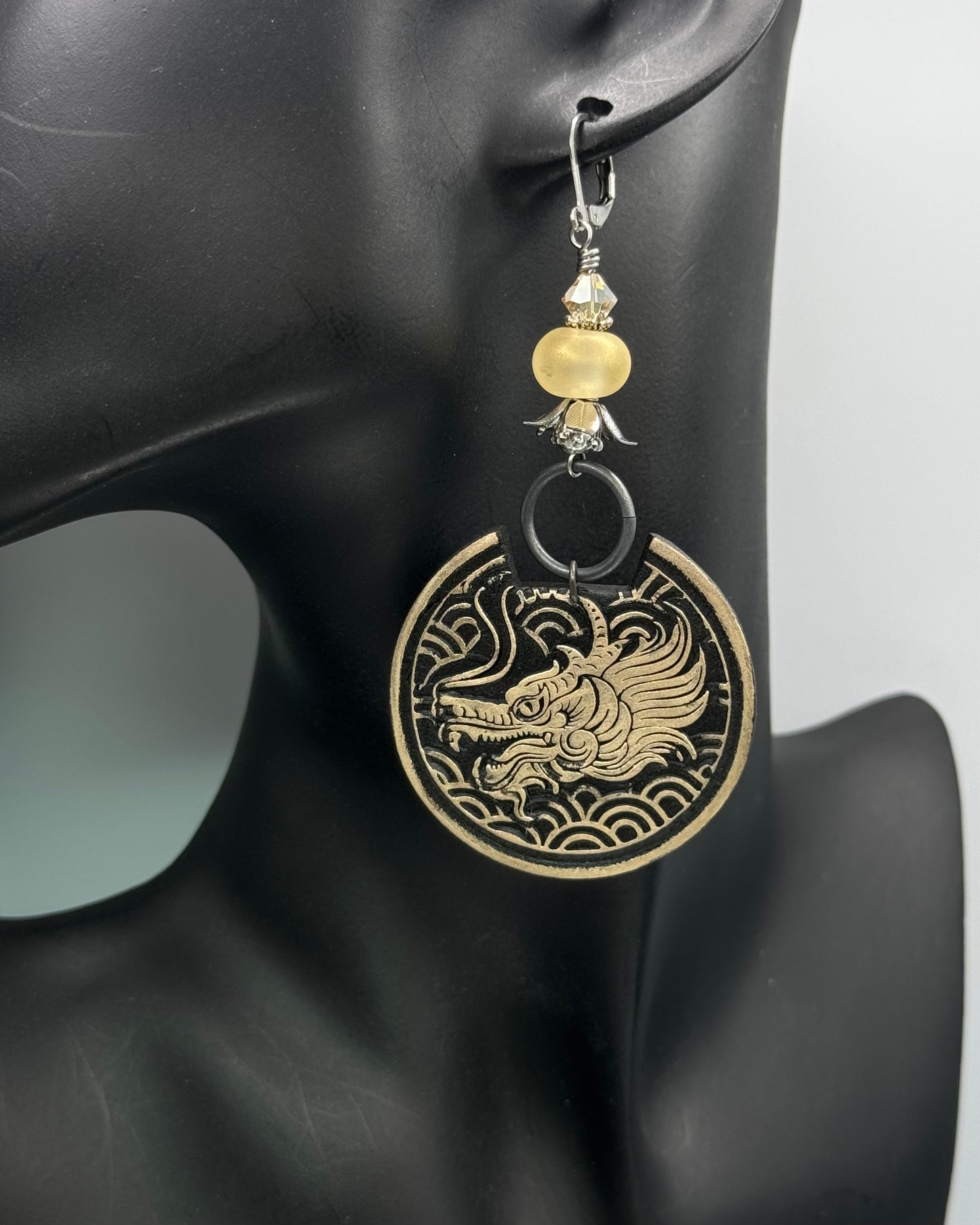 Dragon motif earrings